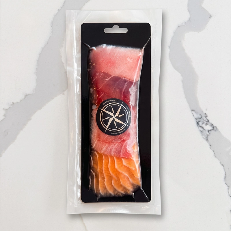 Dúo Sashimi: Atún Aleta Azul y Salmón Fresco (100g)