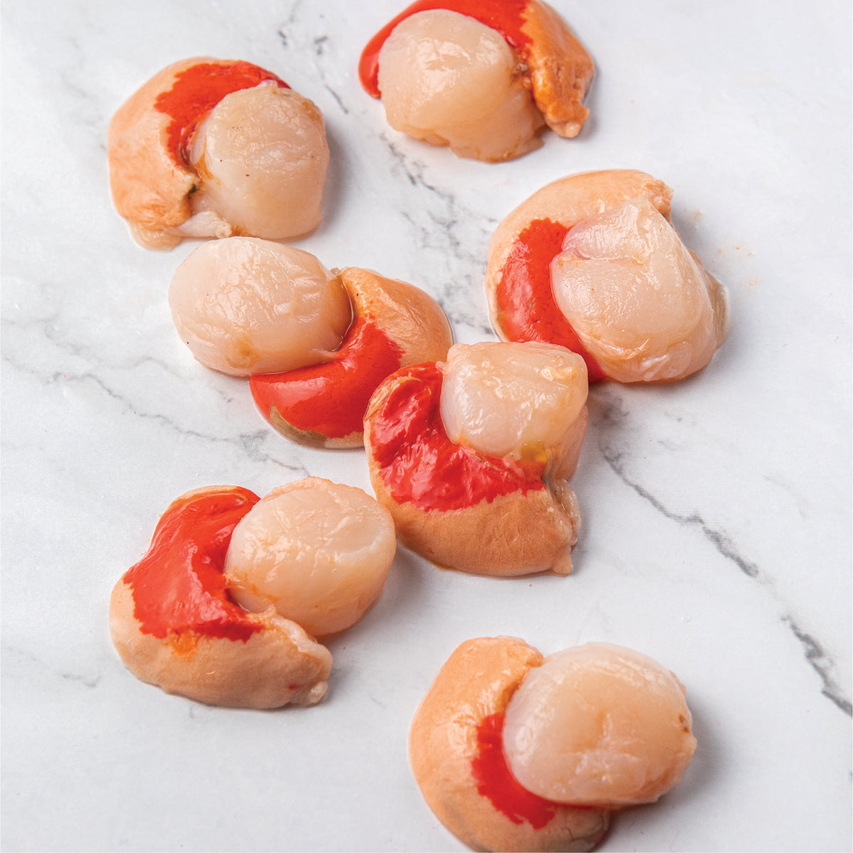 Ostión carne con coral